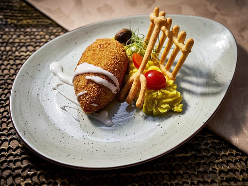 Classic chicken fillet cutlet in crispy breading