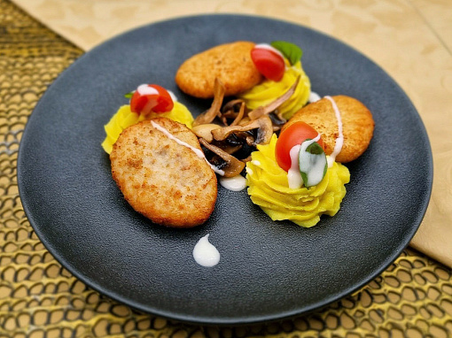 Homemade chicken meat patties with mashed potatoes